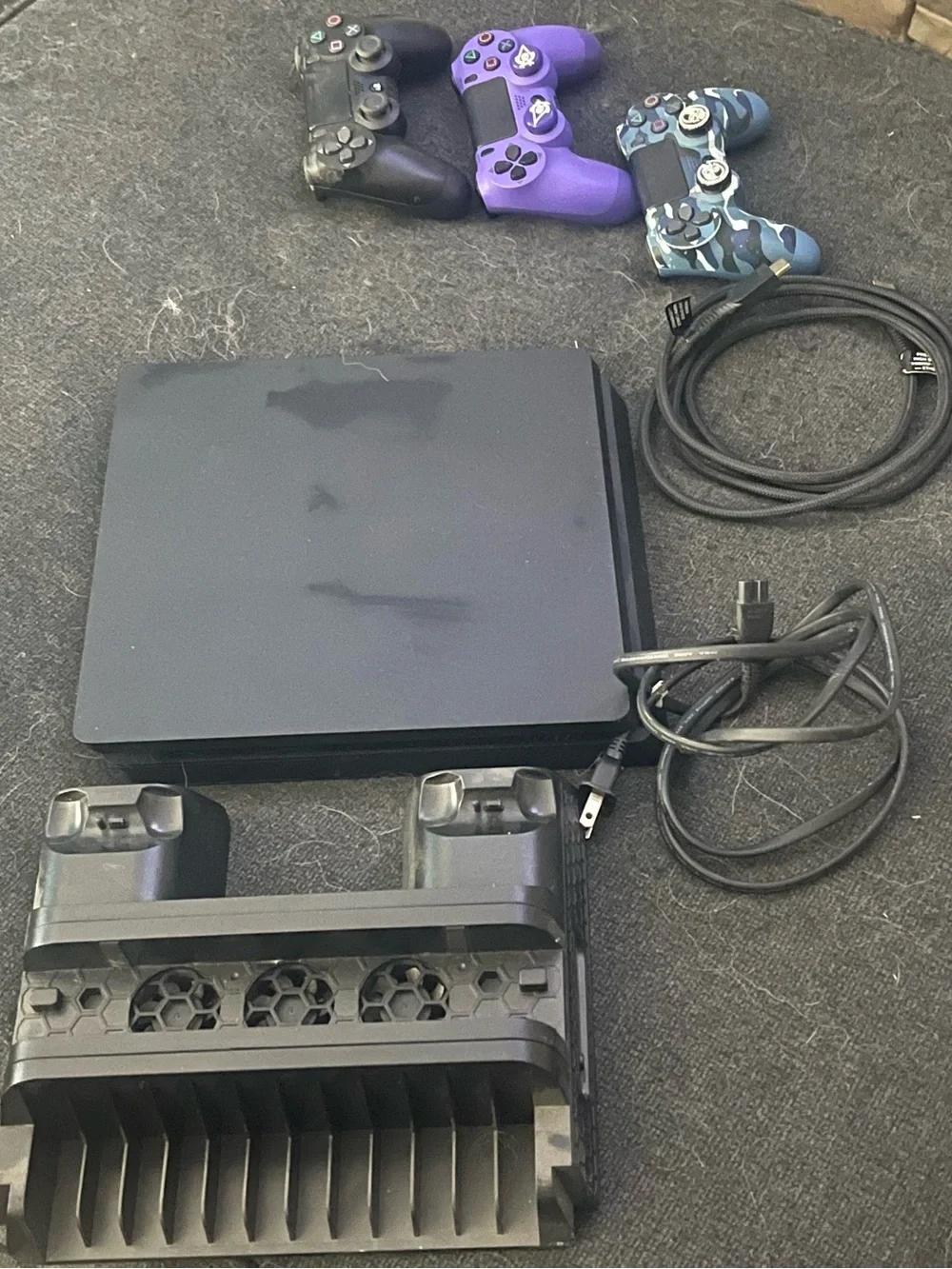 PS Slim 4 1TB- comes with 3 controllers and cooling system
